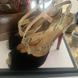 Snake skin and black velvet sling back red bottoms